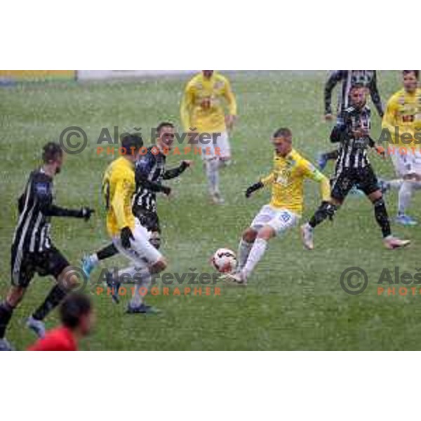 Tomi Horvat and Almin Kurtovic in action during Prva Liga Telemach football match between Bravo and Mura in Ljubljana, Slovenia on April 9, 2022
