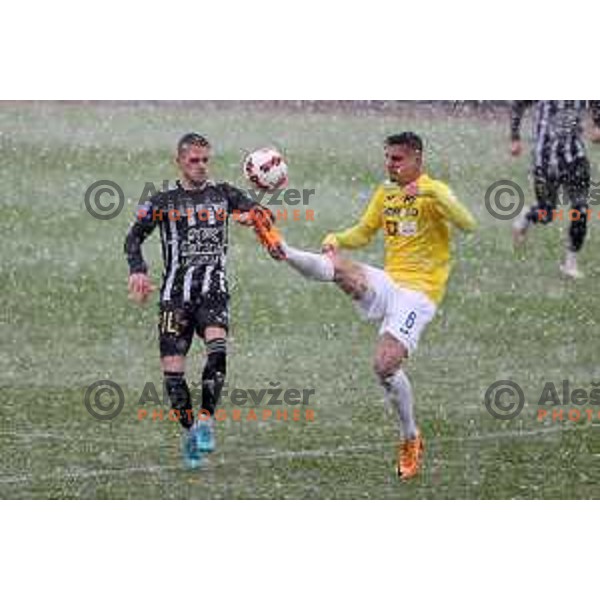 Tomi Horvat and Mitja Krizan in action during Prva Liga Telemach football match between Bravo and Mura in Ljubljana, Slovenia on April 9, 2022