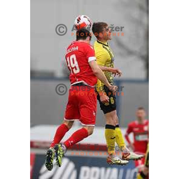 Klemen Bolha and Mark Zabukovnik in action during Prva Liga Telemach 2021-2022 football match between Kalcer Radomlje and Aluminij in Domzale, Slovenia on April 9, 2022