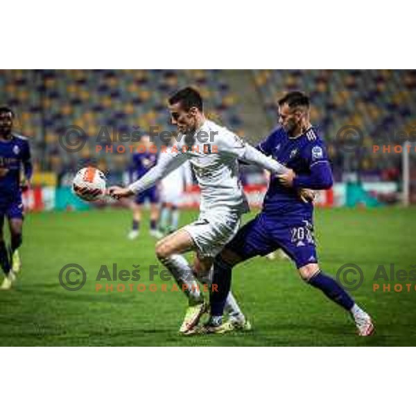 Ivan Prtajin vs Max Watson in action during Prva liga Telemach football match between Maribor and Olimpija in Ljudski vrt, Maribor, Slovenia on April 9, 2022. Photo: Jure Banfi/www.alesfevzer.com