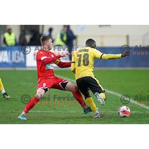 Nik Marinsek and Jonathan Mumbu in action during Prva Liga Telemach 2021-2022 football match between Kalcer Radomlje and Aluminij in Domzale, Slovenia on April 9, 2022