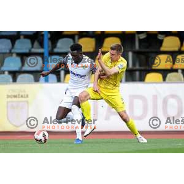 Lamin Colley and Gaber Dobrovoljc in action during Prva Liga Telemach 2021-2022 football match between Domzale and Koper in Domzale, Slovenia on April 16, 2022