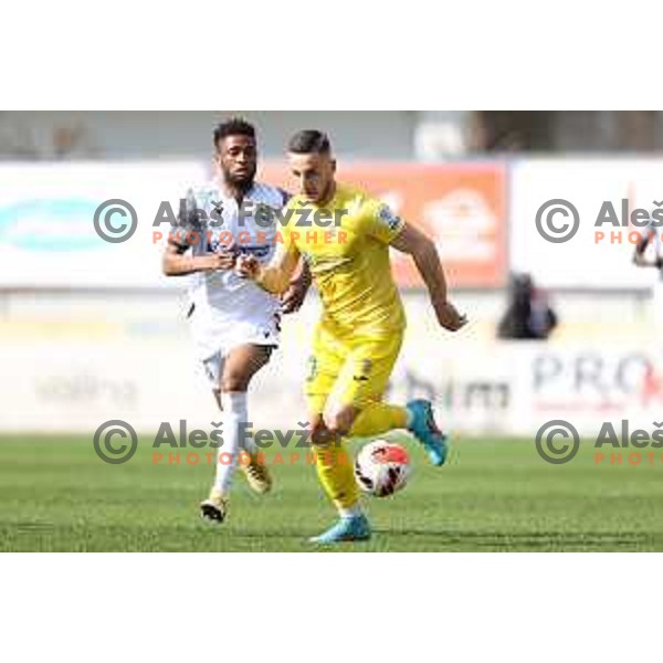 Kaheem Parris and Enes Alic in action during Prva Liga Telemach 2021-2022 football match between Domzale and Koper in Domzale, Slovenia on April 16, 2022
