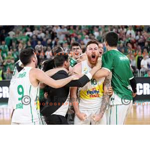 Orunalp Bitim and players of Bursaspor celebrate victory in quarter-final of 7days EuroCup basketball match between Cedevita Olimpija and Frutti Extra Bursaspor in Stozice Arena, Ljubljana, Slovenia on April 27, 2022