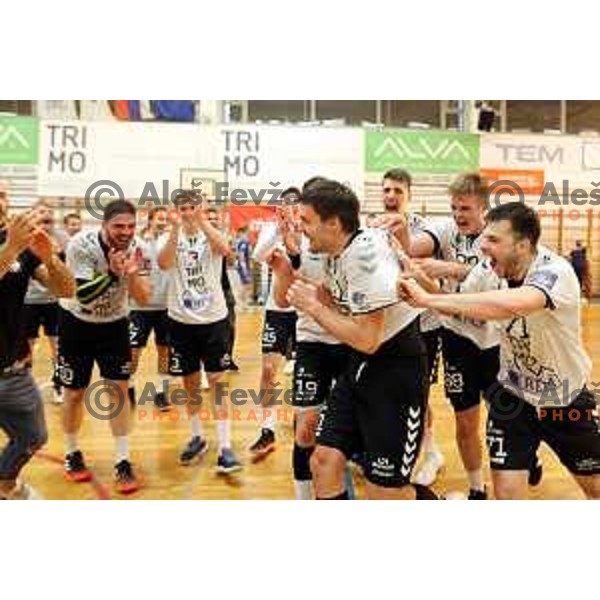 Gregor Potocnik and players of Trimo Trebnje celebrate victory in 1.NLB league handball match Trimo Trebnje and Celje Pivovarna Lasko in Trebnje, Slovenia on April 29, 2022