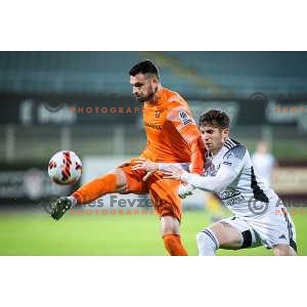 Matjaz Rozman vs Mihael Klepac in action during Prva liga Telemach football match between Celje and Mura in Arena z’dezele in Celje, Slovenia on April 29, 2022. Photo: Jure Banfi