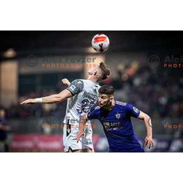 Ivan Novoselec and Rok Kronaveter in action during Prva liga Telemach football match between Maribor and Koper in Ljudski vrt, Maribor, Slovenia on April 30, 2022. Photo: Jure Banfi/www.alesfevzer.com