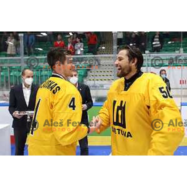 Players of Lithuania celebrate third place at IIHF Ice-hockey World Championship 2022 division I group A after victory in match between Lithuania and Romania in Ljubljana, Slovenia on May 7, 2022