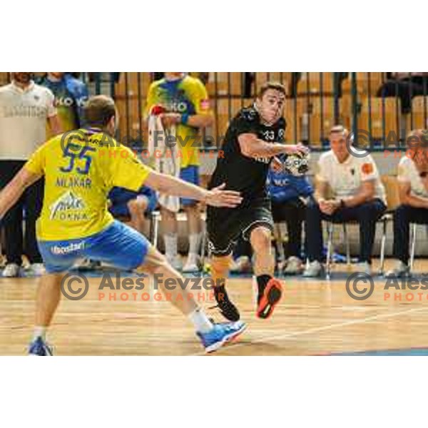 Enej Slatinek Jovicic in action during 1.NLB league handball match between Celje Pivovarna Lasko and Gorenje Velenje in Arena Zlatorog, Celje, Slovenia on May 7, 2022