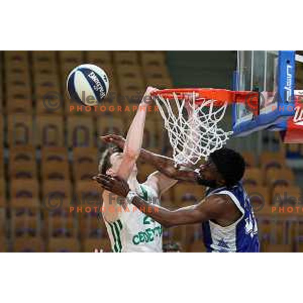Ronald Eugene Jackson JR blocks Luka Scuka during first semi-final match of Nova KBM league between Cedevita Olimpija and Rogaska in Tivoli Hall, Ljubljana, Slovenia on May 14, 2022