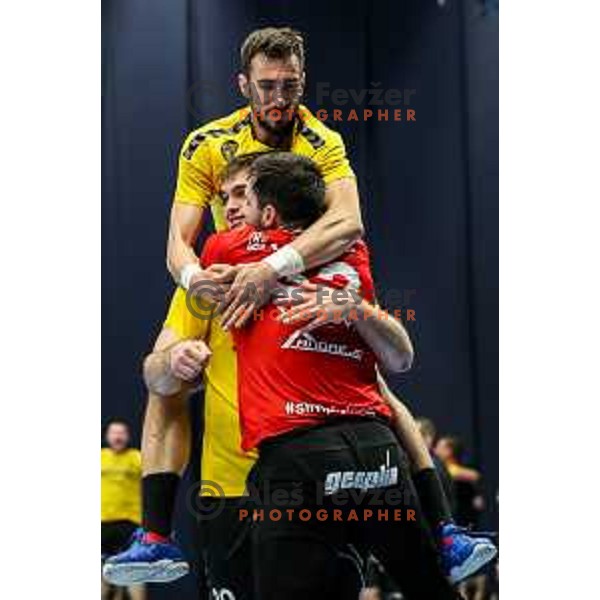 Ibrahim Haseljic and players of Gorenje celebrate victory in semi final of Slovenian handball cup match between Gorenje Velenje and Celje Pivovarna Lasko in Slovenj Gradec, Slovenia on May 14, 2022