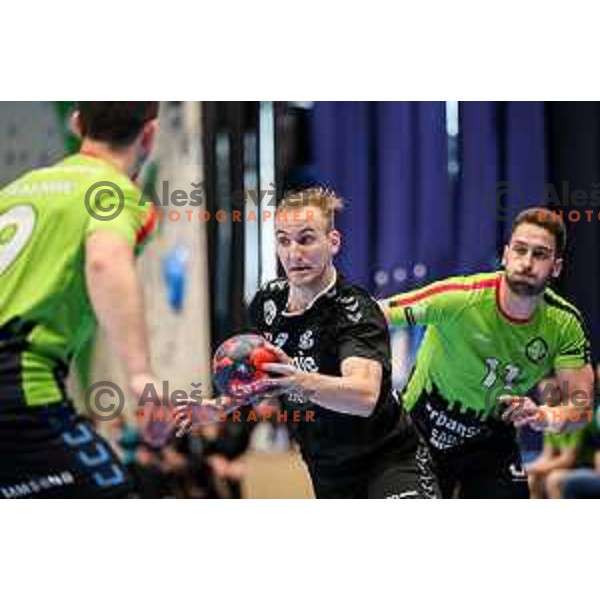 Domen Tajnik in action during final of Slovenian handball cup match between Gorenje Velenje and Urbanscape Loka in Slovenj Gradec, Slovenia on May 15, 2022