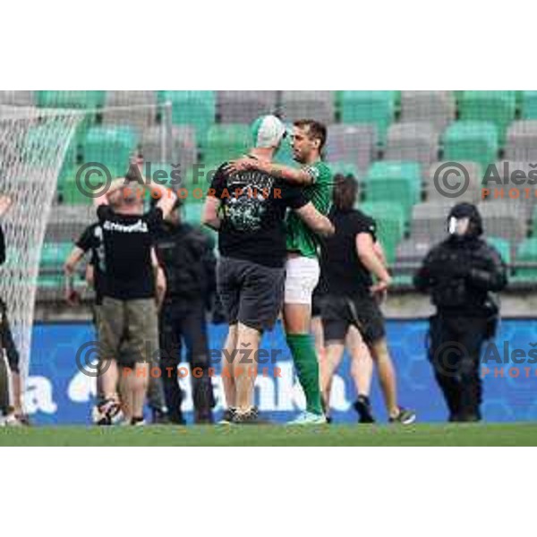 Fans of Olimpija on the pitch during Prva Liga Telemach football match between Olimpija and Mura in SRC Stozice, Ljubljana, Slovenia on May 15, 2022