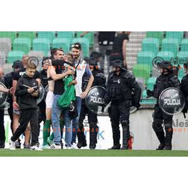 Fans of Olimpija on the pitch during Prva Liga Telemach football match between Olimpija and Mura in SRC Stozice, Ljubljana, Slovenia on May 15, 2022