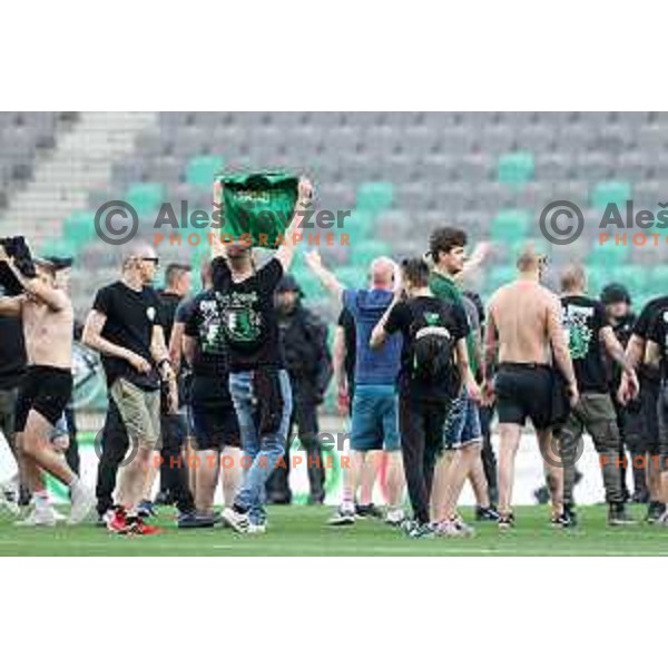 Fans of Olimpija on the pitch during Prva Liga Telemach football match between Olimpija and Mura in SRC Stozice, Ljubljana, Slovenia on May 15, 2022