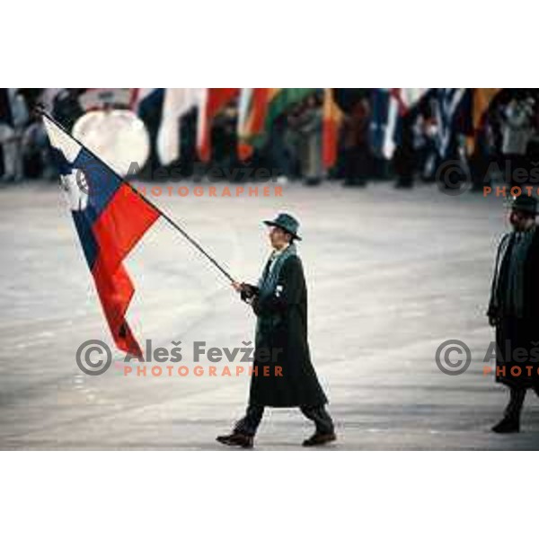 Ski-jumper Franci Petek of Slovenia was flag-bearer for his country at Opening Ceremony of 1992 Winter Olympic Games in Albertville, France on February 8, 1992. Slovenia Olympic team was taking place at the Games for the first time after becaming independ country