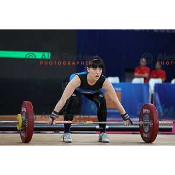 Nastasja Stesl (SLO) competes in snatch in Women’s -59 kg category in Weightlifting at Mediterranean Games in Oran, Algeria on July 2, 2022