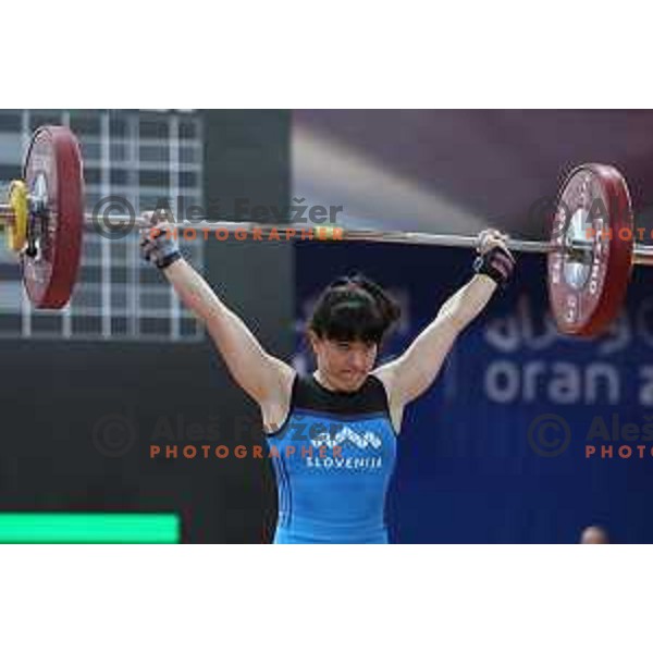 Nastasja Stesl (SLO) competes in snatch in Women’s -59 kg category in Weightlifting at Mediterranean Games in Oran, Algeria on July 2, 2022