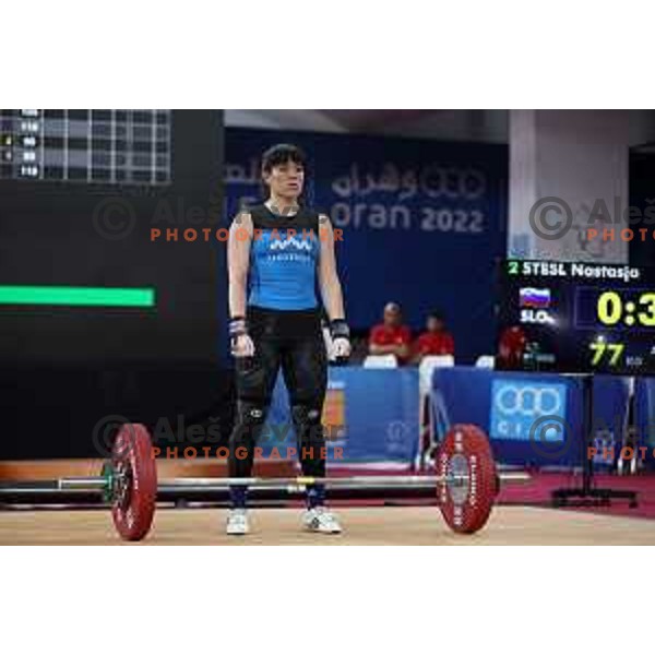 Nastasja Stesl (SLO) competes in snatch in Women’s -59 kg category in Weightlifting at Mediterranean Games in Oran, Algeria on July 2, 2022