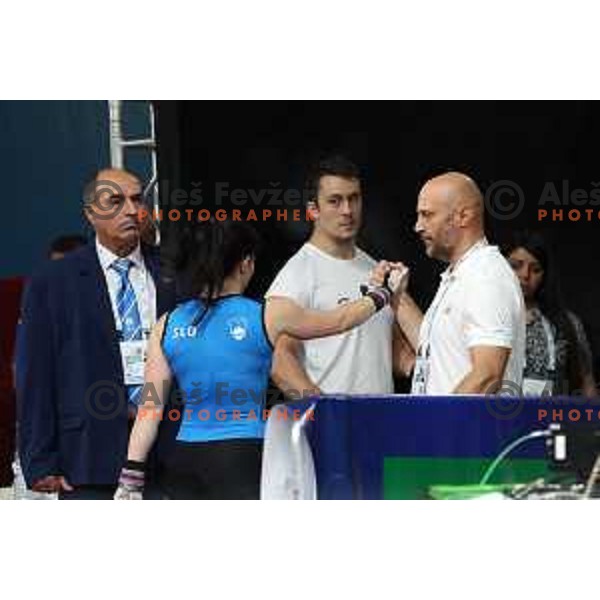 Nastasja Stesl (SLO), Jure Skedelj and coach Damjan Canzek at Weightlifting at Mediterranean Games in Oran, Algeria on July 2, 2022