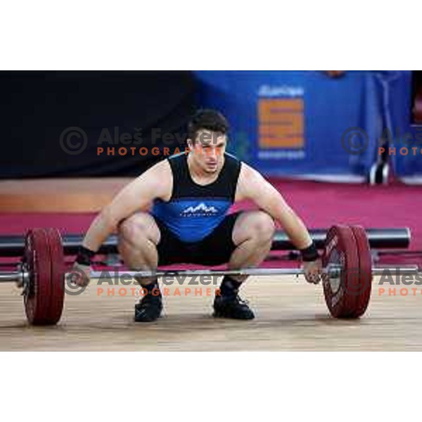 Jure Skedelj (SLO) competes in snatch in Men’s 102 kg category in Weightlifting at Mediterranean Games in Oran, Algeria on July 4, 2022