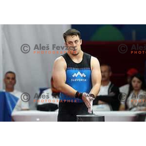 Jure Skedelj (SLO) competes in snatch in Men’s 102 kg category in Weightlifting at Mediterranean Games in Oran, Algeria on July 4, 2022