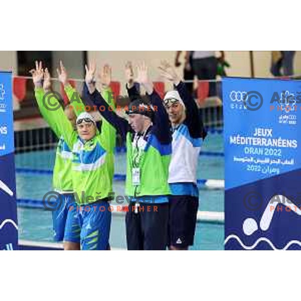 Primoz Senica Pavletic, Anze Fers Erzen, Peter John Stevens and Saso Boskan as Slovenia swimming relay 4x100 meters medley at Mediterranean Games in Oran, Algeria on July 4, 2022