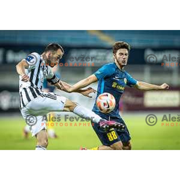 Ziga Kous vs Tamar Svetlin in action during Prva liga Telemach football match between Celje and Mura in Arena z’dezele, Celje, Slovenia on July 31, 2022. Photo: Jure Banfi
