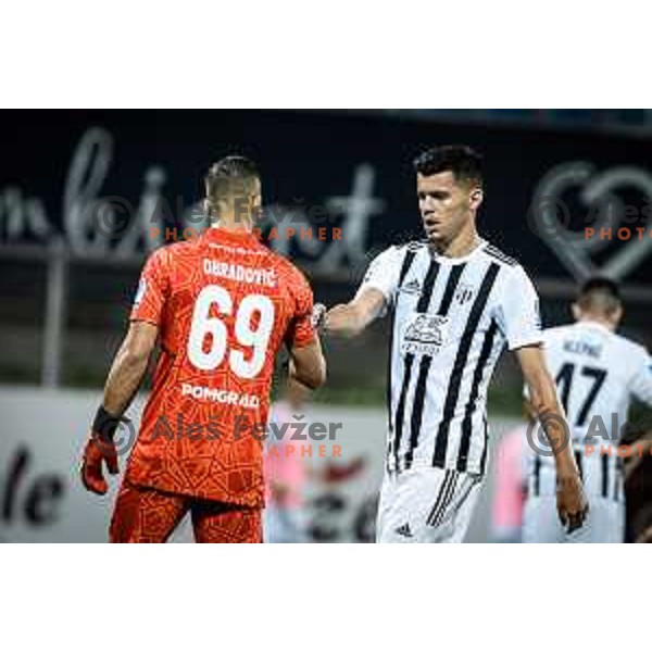 Matko Obradovic and Mirlind Daku in action during Prva liga Telemach football match between Celje and Mura in Arena z’dezele, Celje, Slovenia on July 31, 2022. Photo: Jure Banfi