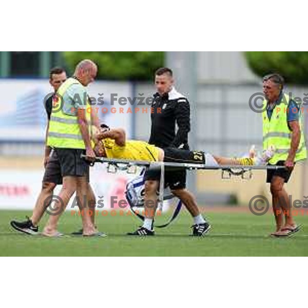 Injured Ivan Calusic is taken from the pitch during Prva Liga Telemach 2022-2023 football match between Kalcer Radomlje and Mura in Domzale, Slovenia on August 7, 2022