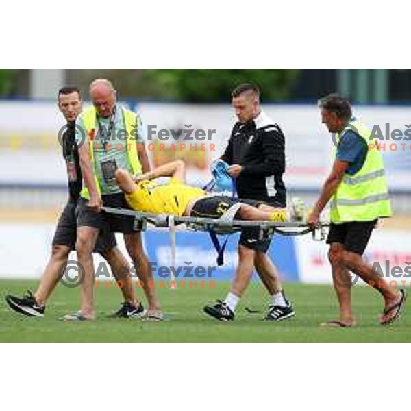 Injured Ivan Calusic is taken from the pitch during Prva Liga Telemach 2022-2023 football match between Kalcer Radomlje and Mura in Domzale, Slovenia on August 7, 2022