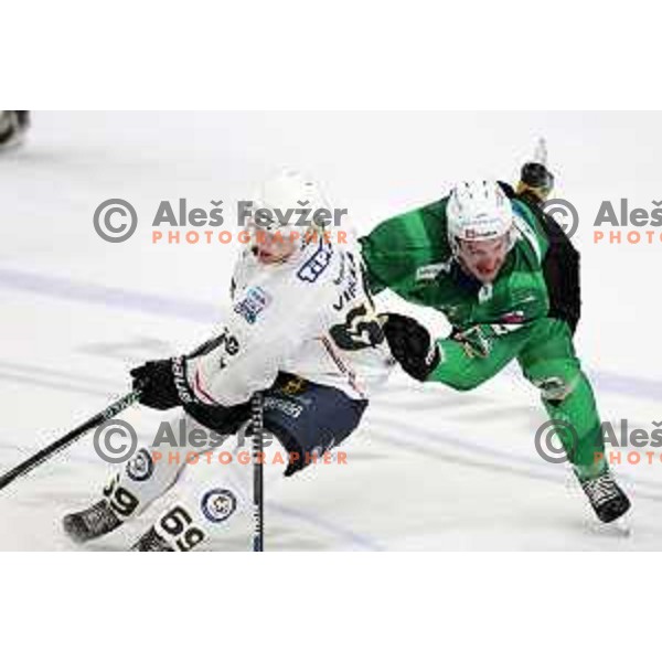 Jaka Sturm and Jesperi Viikila in action during preseason Ice hockey between SZ Olimpija (SLO) and MAC (HUN) in Tivoli Hall, Ljubljana