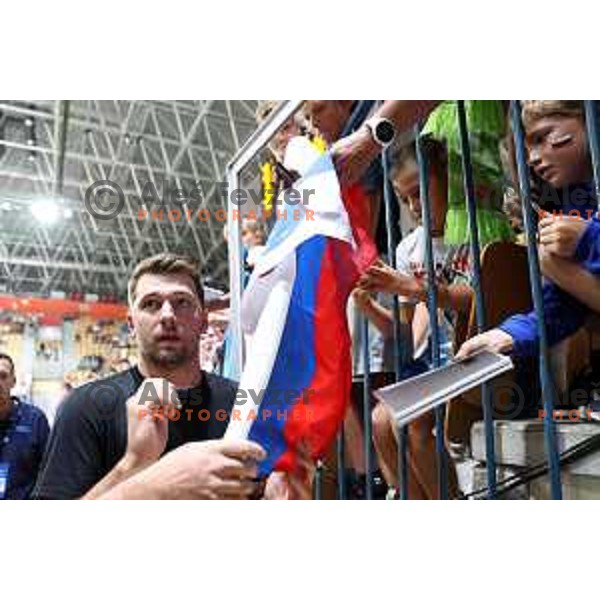 Luka Doncic with fans after warm-uo prior friendly basketball match between Slovenia and Croatia in Arena Zlatorog, Celje, Slovenia on August 20, 2022