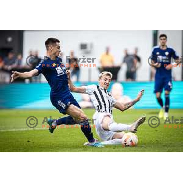 Gregor Sikosek vs Tio Cipot in action during Prva liga Telemach football match between Mura and Maribor in Fazanerija, Murska Sobota, Slovenia on August 28, 2022. Photo: Jure Banfi