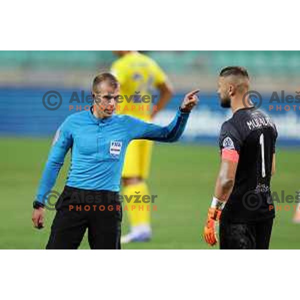 Referee David Smajc and Ajdin Mulalic in action during Prva Liga Telemach 2022-2023 football match between Olimpija and Domzale in SRC Stozice, Ljubljana, Slovenia on September 4, 2022