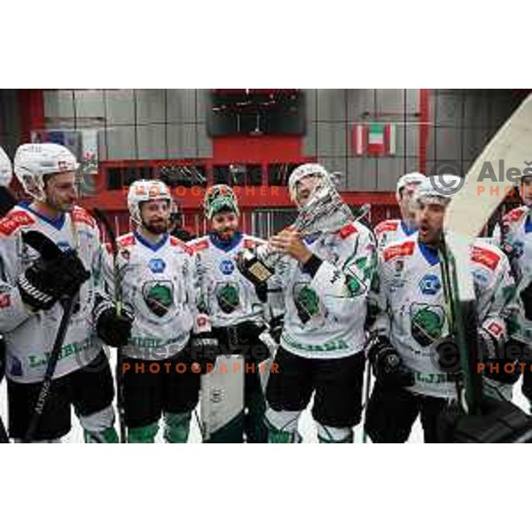Nik Simsic, Zan Us, Ziga Pance with the trophy for the Slovenian ice-hockey Cup winners between SIJ Acroni Jesenice and SZ Olimpija in Podmezakla Hall, Jesenice, Slovenia on September 28, 2022