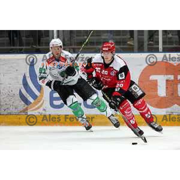 Tadej Cimzar and Rudolf Polcs in action during the Slovenian ice-hockey Cup between SIJ Acroni Jesenice and SZ Olimpija in Podmezakla Hall, Jesenice, Slovenia on September 28, 2022
