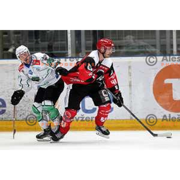 in action during the Slovenian ice-hockey Cup between SIJ Acroni Jesenice and SZ Olimpija in Podmezakla Hall, Jesenice, Slovenia on September 28, 2022