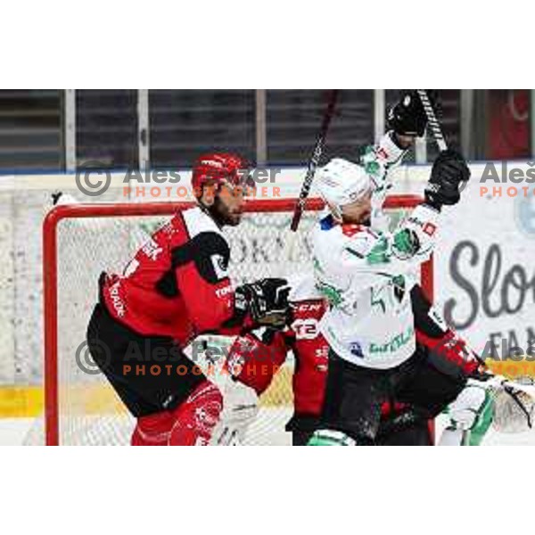 Zan Jezovsek and Gregor Koblar in action during the Slovenian ice-hockey Cup between SIJ Acroni Jesenice and SZ Olimpija in Podmezakla Hall, Jesenice, Slovenia on September 28, 2022