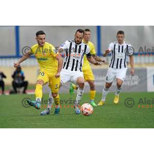 in action during Prva Liga Telemach 2022-2023 football match between Domzale and Mura in Domzale, Slovenia on October 1, 2022