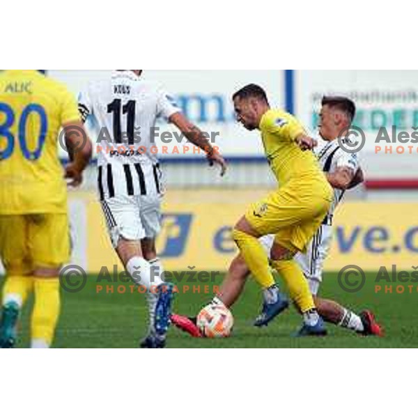 in action during Prva Liga Telemach 2022-2023 football match between Domzale and Mura in Domzale, Slovenia on October 1, 2022