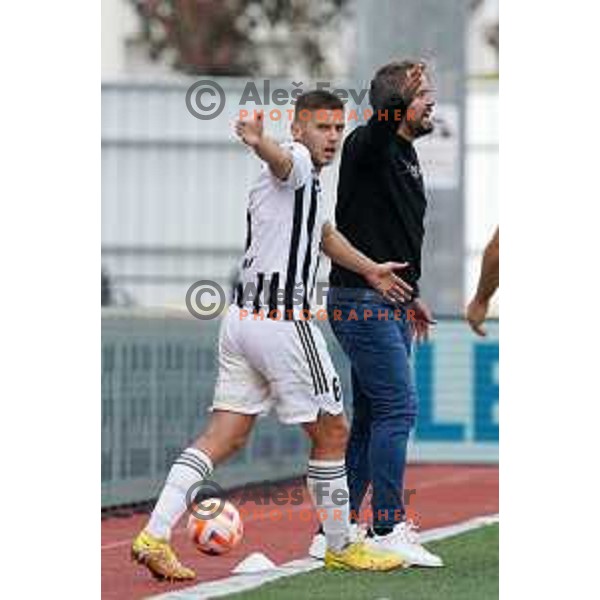 in action during Prva Liga Telemach 2022-2023 football match between Domzale and Mura in Domzale, Slovenia on October 1, 2022