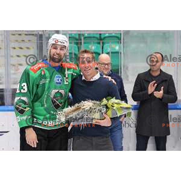 Ziga Pance of SZ Olimpija who retired jersey Nr.16 of his former player Ales Music prior IceHL ice-hockey match between SZ Olimpija (SLO) and Fehervar (HUN) in Tivoli Hall, Ljubljana, Slovenia on October 2, 2022