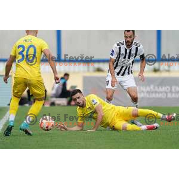 Arnel Jakupovic and Ziga Kous in action during Prva Liga Telemach 2022-2023 football match between Domzale and Mura in Domzale, Slovenia on October 1, 2022