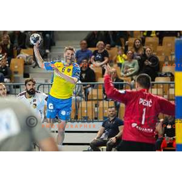 Tadej Mazej in action during EHF Champions League handball match between Celje Pivovarna Lasko and HBC Nantes in Zlatorog Arena, Celje, Slovenia on Oktober 5, 2022