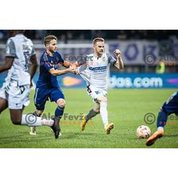 Jan Repas vs Rudi Vancas Pozeg in action during Prva liga Telemach football match between Maribor and Koper in Ljudski vrt, Maribor, Slovenia on October 8, 2022. Photo: Jure Banfi