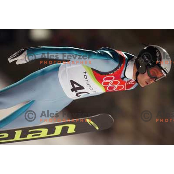 Jernej Damjan of Slovenia jumping in qualification round at 90 m individual ski jumping event in Pragelato at Torino 2006 winter Olympic games, Italy on February 11, 2006