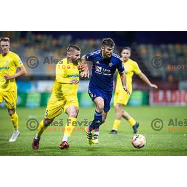 Janez Pisek vs Rok Kronaveter in action during Prva liga Telemach football match between Maribor and Domzale in Ljudski vrt, Maribor, Slovenia on October 22, 2022. Photo: Jure Banfi