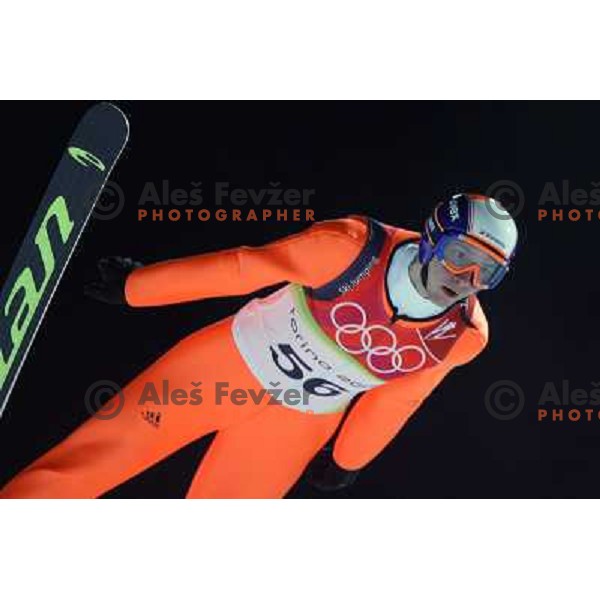 Robi Kranjec of Slovenia jumping in qualification round at 90 m individual ski jumping event in Pragelato at Torino 2006 winter Olympic games, Italy on February 11, 2006
