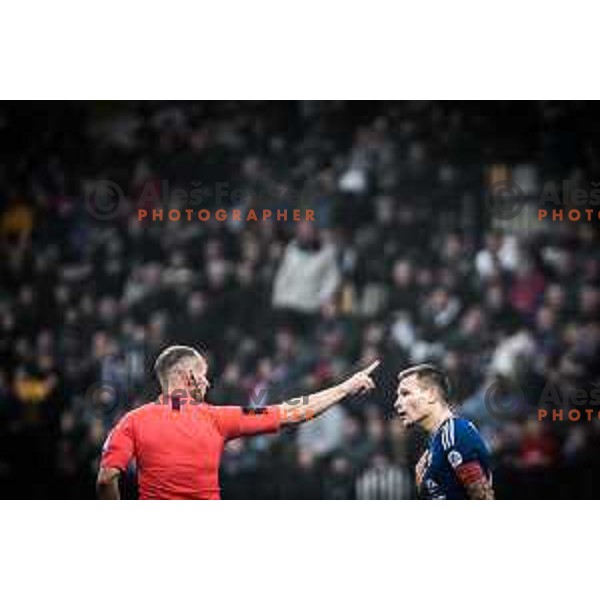 Referee Mihael Antic vs Martin Milec in action during Prva liga Telemach football match between Maribor and Mura in Ljudski vrt, Maribor, Slovenia on November 6, 2022. Photo: Jure Banfi